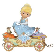 "Celebrate your kiddo's birthday with this Disney Showcase Collection Bibbidi Bobbidi Boo Birthday Parade Figurine Table Decor by Precious Moments. Celebrate your kiddo's birthday with this Disney Showcase Collection Bibbidi Bobbidi Boo Birthday Parade Figurine Table Decor by Precious Moments. Age 2 design 4.33""H x 2.17""W x 3.54""D Weight: 0.77 lbs. Resin Wipe clean Imported Model no. 104404 Size: One Size. Color: Multicolor. Gender: unisex. Age Group: adult." Disney Precious Moments, Bibbidi Bobbidi Boo, 2nd Birthday Gifts, Disney Princess Birthday, Cinderella Birthday, Figurine Collection, Disney Princess Cinderella, Cinderella Disney, Disney Figurines