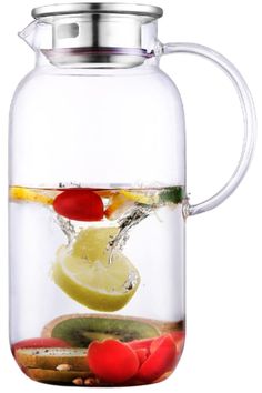 a glass pitcher filled with water and fruit