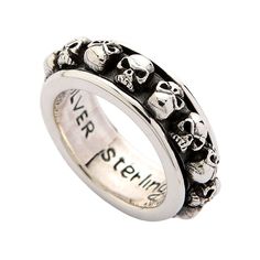 SKULL SOLID 925 MENS STERLING SILVER SPINNER RING ~BRAND NEW & RARE 100% solid sterling silver Stamp .925 trademark inside the band Ring weight : 19 gram Ring width: 10mm A circle of menacing prowess, our Spinner Ring is a unique accessory that is sure to impress. One for the man smothered in strength and exuding a masculine charm, this piece plucks its inspiration from the depths of the underworld. A row of skull eye sockets glare out - warning every passer-by of the perils due to them for one Gothic Ring, Spinning Rings, The Underworld, Gothic Rings, Silver Spinner Rings, Skull Head, Spinner Ring, Spinner Rings, Sterling Silver Mens