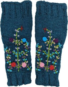 A handmade and easy-to-wear pure wool leg warmers with knitted flowers and stems.  These peacock blue leg warmers are so cozy and are of free size (fits almost all). #tlb #bohogift #Floral #Handmade #HolidayGiftIdea #WoolenLegWarmer #UnisexLegWarmer Blue Fitted Leg Warmers For Fall, Handmade One Size Leg Warmers, Hand Knitted Casual Leg Warmers, Blue Knitted Leg Warmers For Winter, Blue One-size Leg Warmers For Fall, Cozy Blue Leg Warmers For Winter, Knitted Blue Leg Warmers For Winter, Cottagecore Leg Warmers, Blue Leg Warmers