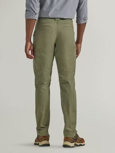 RUGGED AND OUTDOORSY Rugged and outdoorsy, these Wrangler® men's utility pants offer outdoor function and comfort to help you make the most of time spent in the great outdoors. They're made from a comfortable blend of cotton with a bit of stretch to prioritize maximum mobility at all times. The pant's slash front pockets, welt hip pockets, side patch cargo pocket, and side welt pocket give you plenty of storage space for all the essentials—phone, keys, wallet, and more. Enhanced with moisture-wi Rugged Straight Leg Cargo Pants For Outdoor, Relaxed Fit Utility Work Pants For Outdoor, Rugged Outdoor Bottoms With Side Pockets, Rugged Bottoms With Side Pockets For Outdoor, Fitted Utility Cargo Pants For Outdoor Activities, Rugged Straight Leg Bottoms For Outdoor, Rugged Relaxed Fit Bottoms For Outdoor, Utility Hunting Bottoms With Pockets, Casual Fitted Work Pants For Outdoor