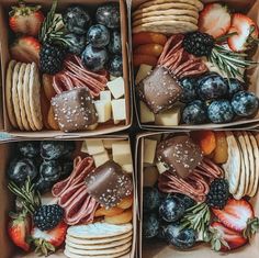 three boxes filled with different types of snacks and fruit on top of each other,