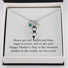 three peas necklace in a gift box with an inspirational quote from mother's day