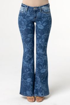 Mid-rise, medium-wash flare jeans- Laser printed floral design- Traditional back pocket design- Embossed white leather Miss Me brand patch- Subtle distress on front right pocket- 5-pocket designModel is wearing size: 25Model Measurements:Height: 5'9"Bust: 32"Waist: 26"Hips: 35"Fabric Content: 73% Cotton, 24% Polyester, 3% ElastaneCare: Gentle machine wash inside-out with like colors in cold water. Tumble dry low.Style No. M2327F-M909, M2327FV-M909, M2327FS-M909 Unique Pants, Denim Flare Jeans, Printed Jeans, Denim Flares, Virtual Closet, Flared Jeans, Blue Jean, Outfits Ideas, Pocket Design