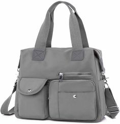 PRICES MAY VARY. The handbag is made of durable oxford cloth and sturdy Polyester. Size: Approx. L 13.8 x H 12.6 x D 5.5 inch; Handle drop length approx. 8.6 inch. Rich pockets for storage: Main zip compartment with 2 slot pockets and a zip pouch. 4 front pockets and a rear zip pocket. 2 Side pockets Design: The design of zipper in the back is an Anti-theft function; Comes with an adjustable shoulder strap. Simple and stylish design, long shoulder strap, easy to wear on your shoulder, great as h Utility Tote Bag, Pockets Design, Work Tote Bag, Utility Tote, Travel Bags For Women, Work Tote, Work Bag, Zip Pouch, Anti Theft