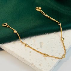 🌻This beautiful little star bracelet, made of gold-plated sterling silver, features a minimalist design. It is also perfect for layering if you enjoy stacking bracelets. 🥰This piece is meticulously crafted from S925 sterling silver (total 2.6g，5.9"-7.5") and finished with a luxurious coating of genuine 18k gold plating. 🥰This bracelet is adjustable to fit your desired size. 🥰We will send it in a beautiful jewelry box and package it carefully. We offer boxes in blue, green, white, and black. Dainty Heart Bracelet With Adjustable Chain For Wedding, Dainty Chain Bracelet For Valentine's Day, Delicate Heart Bracelet With Delicate Chain, Minimalist Gold Chain Bracelet With Heart Charm, Minimalist Heart Shaped Adjustable Chain Bracelet, Dainty Heart Bracelet With Adjustable Chain, Dainty Gold Bracelet With Heart Charm, Minimalist Heart-shaped Adjustable Chain Bracelet, Dainty Gold Plated Heart Bracelet