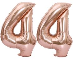 two rose gold foil balloons shaped like the number four