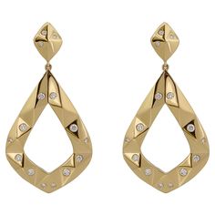 These earrings are part of the ORIGAMI collection. They were inspired by geometric aesthetics giving the earrings texture and dimension. The earrings are made with solid 18k yellow gold and a high polished shine. 30pcs of sprinkled F color diamonds ranging from 1.2mm to 2.0mm complete this look. Every attention to detail came to mind when creating these earrings. The back of the earrings were also designed with an open back and geometric lines to catch the light to let the diamonds sparkle. Its Modern Hoop Earrings, Sapphire And Diamond Earrings, Pearl Jewels, Vvs Diamond, Wedding Rings Round, Yellow Gold Earrings, Gold Earrings Designs, Diamond Drops, Diamond Drop Earrings