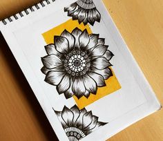 a drawing of a sunflower on a piece of paper