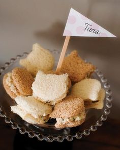 there is a plate full of cookies and marshmallows with a flag on top