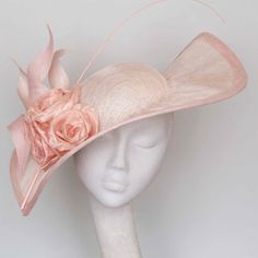 A hand blocked pale pink sinamay 'wave' hat.  Trimmed with sinamay swirls and hand made silk flowers. A sophisticated and contemporary headpiece  Perfect for Royal Ascot, Kentucky Derby and the must have hat for the Mother of the Bride. Secured with hat elastic which is comfortable and easily hidden. International shipping is via courier Processing time 2 weeks This hat can be made in most colours Fascinator Ideas, Blush Pink Fascinator, Light Pink Hat, Grey Fascinator, Navy Fascinator, Special Occasion Hats, Mother Of The Bride Hats, Headwear Fashion, Royal Ascot Hats