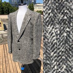 "Gorgeous vintage mean wool tweed sport coat. The wool is thicker than typical tweed blazer material, it is almost overcoat weight wool. It is tight woven with a smooth boiled/melton type tightness with blurry herringbone effect. Great condition with no notable flaws. Has leather wrapped ball buttons. No size tag. Estimated Mens size 38 Regular. Measurements: Shoulders seam to seam:17.5\"-18\" Sleeves:24.5\"-24.75\" Back Length:30\" Pit to pit:21\" across waist :19\"" Luxury Herringbone Pattern Sport Coat For Winter, Luxury Gray Sport Coat For Workwear, Luxury Semi-formal Tweed Sport Coat, Luxury Winter Single-breasted Sport Coat, Luxury Tailored Sport Coat With Double-breasted Buttons, Tweed Sport Coat, Mens Sport Coat, Grey Herringbone, Woven Jacket