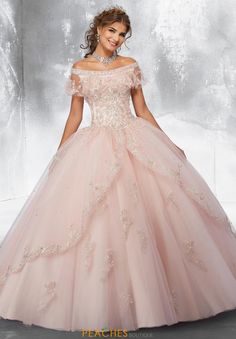 This unique Vizcaya 89181 will ensure that all eyes are on you. Featuring an off the shoulder neckline and embroidery throughout the bodice, you are bound to stand out. A corset lace back leads into a full tulle skirt, with stunning bead work and embroidery scattered throughout to make you feel like royalty. A breath taking train will elegantly flow behind you as you walk. Find your dream dress at Peaches Boutique. Quinceanera Dresses Damas, Mori Lee Quinceanera Dresses, Damas Dresses, Quinceñera Dresses, Quinceanera Dresses Pink, Pretty Quinceanera Dresses, Quince Dress, Dresses Quinceanera, Ball Gown Skirt