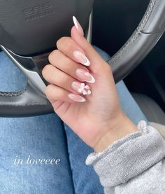 Almond Nails French Design, Almond French Tip Nails With Charms, Almond Nails With Bow Charm, Almond French Tip Nails With Bow, French Tip Acrylic Nails With Bow, Bow Nails Almond, French Bow Nails, Almond Nails Bow