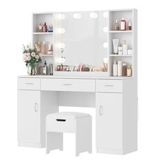 a white vanity with lighted mirror and stool