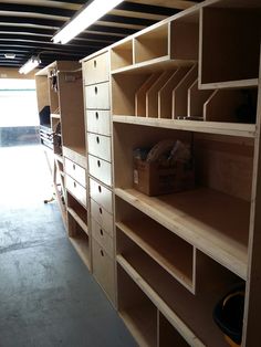 the shelves are empty and ready to be put into storage units in this garage area