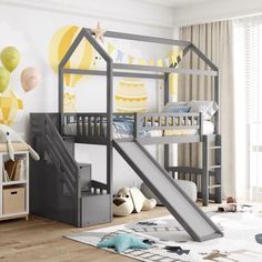 a child's bedroom with a bunk bed and slide