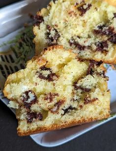 two pieces of cake sitting on top of a white plate