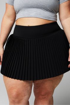 Hot Shot Pleated Skirt Fabletics black female Activewear >> Womens >> Bottoms >> Skirts plus Everyday/Tennis Hidden Pockets/Moisture-Wicking Black Stretch Pleated Tennis Skirt, Black Pleated Sporty Bottoms, Black Sporty Pleated Bottoms, Sporty Black Pleated Bottoms, Sporty Black Pleated Skort, Black Stretch Pleated Swim Skirt, Female Activewear, Women's Sportswear, Hot Shots