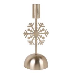 a metal candle holder with a snowflake on it