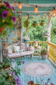 the porch is decorated with flowers and plants