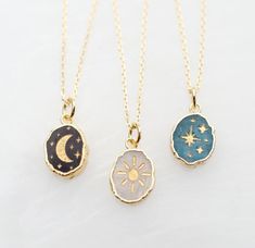 ---------------- PLEASE READ DESCRIPTION BEFORE ORDERING -------------PRODUCT DETAILS:This listing is for one necklace.Pendants are only available as pictured. The moon engraving is only available on Onyx, the sun engraving on Moonstone, and the stars engraving on Apatite. Each pendant is a natural stone, with a gold plated over sterling silver border. Exact coloration and size may vary from 16-18mm. This item is only available in gold at this time. Moonstone is beautiful in person - photos don' Celestial Style Natural Stones Pendant Jewelry, Celestial Gemstone Round Pendant Necklace, Celestial Gemstone Pendant Necklace, Celestial Zodiac Pendant Necklace, Gold Moon-shaped Celestial Charm Necklace, Galaxy Jewelry, Astrology Necklace, Gold Moon Necklace, Monogram Keychain