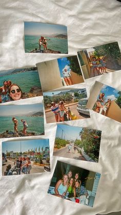 several polaroid photos are laying on top of a white sheet with some people in the background