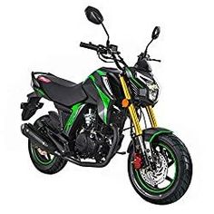 a green and black motorcycle on a white background