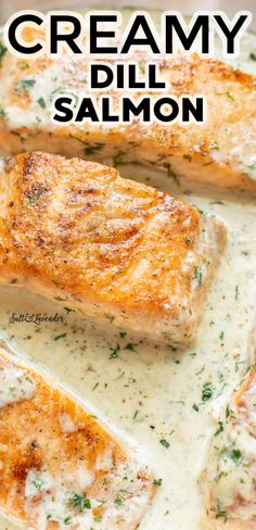 grilled salmon fillets with creamy dill sauce in a skillet on a yellow and white plate