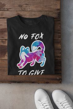 a t - shirt that says no fox to give on it next to white shoes