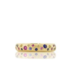 The Medium Multi Sapphire Band by Adel Chefridi is a unique, standalone piece. This one-of-a-kind piece is hand set with multi colored sapphires lining its gold vibrant base. Perfect for transitioning from day to night with ease. Shop our jewelry collections today to find your perfect match. Platinum Wedding Bands, Silver Rings Set, Persian Turquoise Ring, Persian Turquoise, Platinum Wedding Band, Sterling Silver Rings Set, Sapphire Band, Multi Sapphire, Rainbow Jewelry