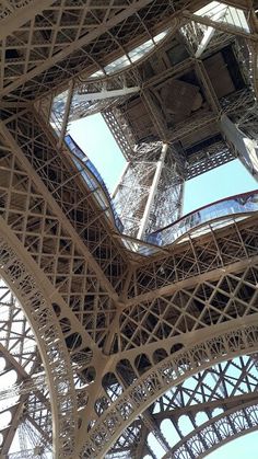 looking up at the eiffel tower from below