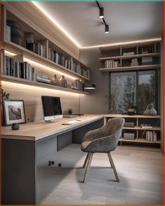 a computer desk sitting under a window next to a bookshelf