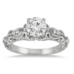 a white gold engagement ring with diamonds