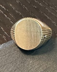 A Rare 10K gold not monogramed signet ring with a hidden locket.  Condition as photos show in great condition, sliding hidden locket works perfectly.  Size 10, wt.- 7.8 grams.  Great classic modernist design and with the hidden locket-a very rare find and in such great condition-a great ring to wear and what a conversation piece. Envelope Stamp, Modernist Design, Gold Signet Ring, Lovely Ring, Signet Ring, 10k Gold, Conversation Piece, Rings Statement, Locket