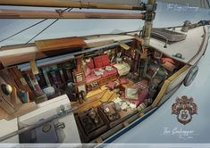 the interior of a sailboat with lots of furniture and accessories on it's deck