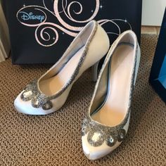 Feel Like A Princess In These Beautiful Embellished Ivory Satin Cinderella Pumps. The Satin Blue Trim In The Lining Can Even Be Your “Something Blue” On Your Wedding Day! New, Never Worn Size 7 With 4.5 Inch Heel. Details Include Rhinestones Surrounded By Glass Beads. Free Shipping Disney Heels, Black Crochet Lace Top, Elsa Shoes, Cinderella Heels, Shoes Disney, Vegan Heels, Rhinestone Pumps, Irregular Choice Shoes, Disney Shoes