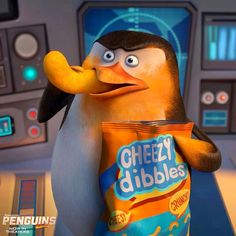 a cartoon penguin holding a bag of cheezy pebbles in a scene from the penguins movie