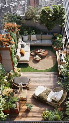 an aerial view of a rooftop garden with couches and tables