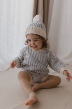 Knit Sweater - Tide By The Little Kiwi Co | Modern Kids Items based in the US | Curated pieces to be passed down | Ships worldwide. This charming knit sweater in a serene 'Tide' hue is crafted from 100% organic cotton, offering a relaxed fit with a textured pattern, making it an ideal choice for keeping your little one cozy and stylish during cooler days. Discover Them Now! eco-friendly children's clothing, toddler knit sweater inspiration, unisex kids' sweater, comfortable kids' apparel Baby Overalls