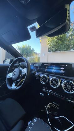 the interior of a car with electronic controls