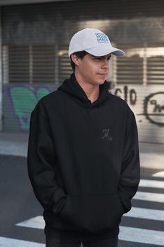 This unisex heavy blend hooded sweatshirt is relaxation itself. Made with a thick blend of cotton and polyester, it feels plush, soft and warm, a perfect choice for any cold day. In the front, the spacious kangaroo pocket adds daily practicality while the hood's drawstring is the same color as the base sweater for extra style points.\n.: 50% cotton, 50% polyester (fiber content may vary for different colors)\n.: Medium-heavy fabric (8.0 oz/yd² (271 g/mn.: Classic fit\n.: Tear-away label\n.: Runs true to size Sweatshirt Hoodie, Cold Day, Heavy Fabric, Letter Print, Hooded Sweatshirt, Kangaroo Pocket, Letter Prints, Hooded Sweatshirts, Relaxation