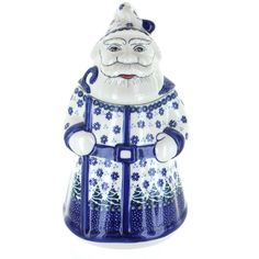 a blue and white santa clause figurine on a white background