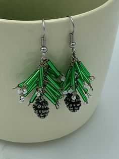 Zinc alloy pine cone charms, green bugle beads and pearl seed beads attached to a chain, resembling a pine branch dusted with snow. Pine Cone Earrings Diy, Beaded Pinecone, Pine Cone Earrings, Pine Cone Jewelry, Pine Branch, Bugle Beads, Bead Jewelry, Cluster Earrings, Pine Cone