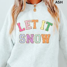 - 8 oz., 50% USA cotton, 50% polyester- Pill-resistant air jet yarn- Unisex Sizing- Will not shrink when washed/dried- Runs true to size, Size up for oversized look Oversized Look, Charcoal Color, Let It Snow, White Sweatshirt, Air Jet, Light Pink, Sparkle, Yarn, Let It Be