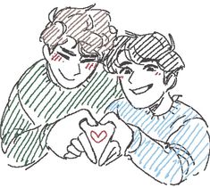 two boys making a heart with their hands