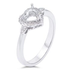 Absolutely Gorgeous Heart Ring Semi-Mount With Diamond Accent, handcrafted in Solid 14k White Gold. Product Number:SMBIG51689  Center Stone Size:6 X 6 X 5 mm  Center Stone Shape:Heart  Metal Type:14k Gold  Metal Weight:2.924 gm  Diamond Weight:0.13 cts  Diamond Color:G-h  Diamond Clarity:Si2  # of diamonds:24  Style number:RG6043  Ring Size:6.5  Band Thickness:3mm  1. We offer Easy PAYMENT PLAN 3 to 6-month payments. Message us for details 2. We can customize our Semi-Mounts in different sizes, shapes, and gold colors. 3. We guarantee all of our diamonds are 100% Conflict-free Diamonds  4. We aim to ship all orders within 2-3 business days (almost always sooner) For any questions or specific orders please contact us via Etsy messaging. RETURNS: 1. We offer 30 days to return your purchase f White Gold Open Heart Classic Ring, Classic Valentine's Day Jewelry With Center Stone, Classic White Gold Round Heart Ring, Valentine's Day White Gold Halo Jewelry, Classic Silver Heart Ring With Halo Setting, White Gold Heart-shaped Fine Jewelry Ring, Formal Heart Ring With Halo Setting And Round Cut, White Gold Heart Ring With Prong Setting, Formal Heart Ring With Halo Setting