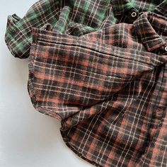 This stylish plaid shirt is perfect for your little one. Made from soft cotton, it's comfortable and breathable. The full-length sleeves and turn-down collar keep your child warm and stylish. The plaid pattern is classic and versatile, and it can be dressed up or down. This shirt is perfect for everyday wear, but it's also dressy enough for special occasions. Pair it with jeans, shorts, or leggings for a casual look, or dress it up with a pair of slacks or a skirt. Features: Korean style Full-le Fall Cotton Shirt With Grid Pattern, Vintage Plaid, Clothing Size Chart, Baby Grows, Plaid Pattern, Jeans Shorts, Plaid Shirt, Cotton Material, Stylish Outfits