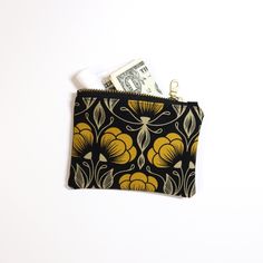 Explore the practicality of our Yellow Floral Coin Pouch, a compact solution for your coins and small items. This coin pouch combines style and functionality, making it a perfect mini wallet or accessory holder. The unique design adds a sophisticated touch to your daily routine. Imagine easily finding your small essentials in this stylish pouch. Order now and keep your belongings neatly organized! Yellow Coin Purse For Everyday Use, Trendy Coin Purse With Removable Pouch For On-the-go, Retro Pouch Coin Purse, Small Coin Pouch, Compact Coin Purse With Removable Pouch For On-the-go, Accessories Holder, Mini Wallet, Market Tote, Zip Pouch