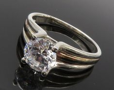 925 Sterling Silver - Prong Set Cubic Zirconia Solitaire Ring Sz 10 - RG12447  925 Sterling Silver - Prong Set Cubic Zirconia Solitaire Ring Sz 10 - RG12447  Jewelry Type:         Ring  Metal Type:            925 Silver  Metal Size:             10 Finger  Stone Type:            Cubic Zirconia   Condition:              N/A  Jewelry Weight:     4.5 Grams  PLEASE NOTE: THIS ITEM IS PRE-OWNED. ALTHOUGH MOST ITEMS ARE IN VERY GOOD CONDITION, SOME MAY NEED CLEANING AND/OR MINOR REPAIRS. WE MAKE A VERY STRONG EFFORT TO UPLOAD CLEAR PICTURES. PLEASE INSPECT ALL PICTURES AND ASK ALL QUESTIONS YOU MAY HAVE PRIOR TO MAKING A PURCHASE. NOT ALL STONES ARE GENUINE, SOME ARE ENHANCED OR CREATED. Ring Metal, Solitaire Ring, Prong Setting, Metallic Silver, 925 Silver, Cubic Zirconia, Repair, 925 Sterling Silver, Sterling Silver